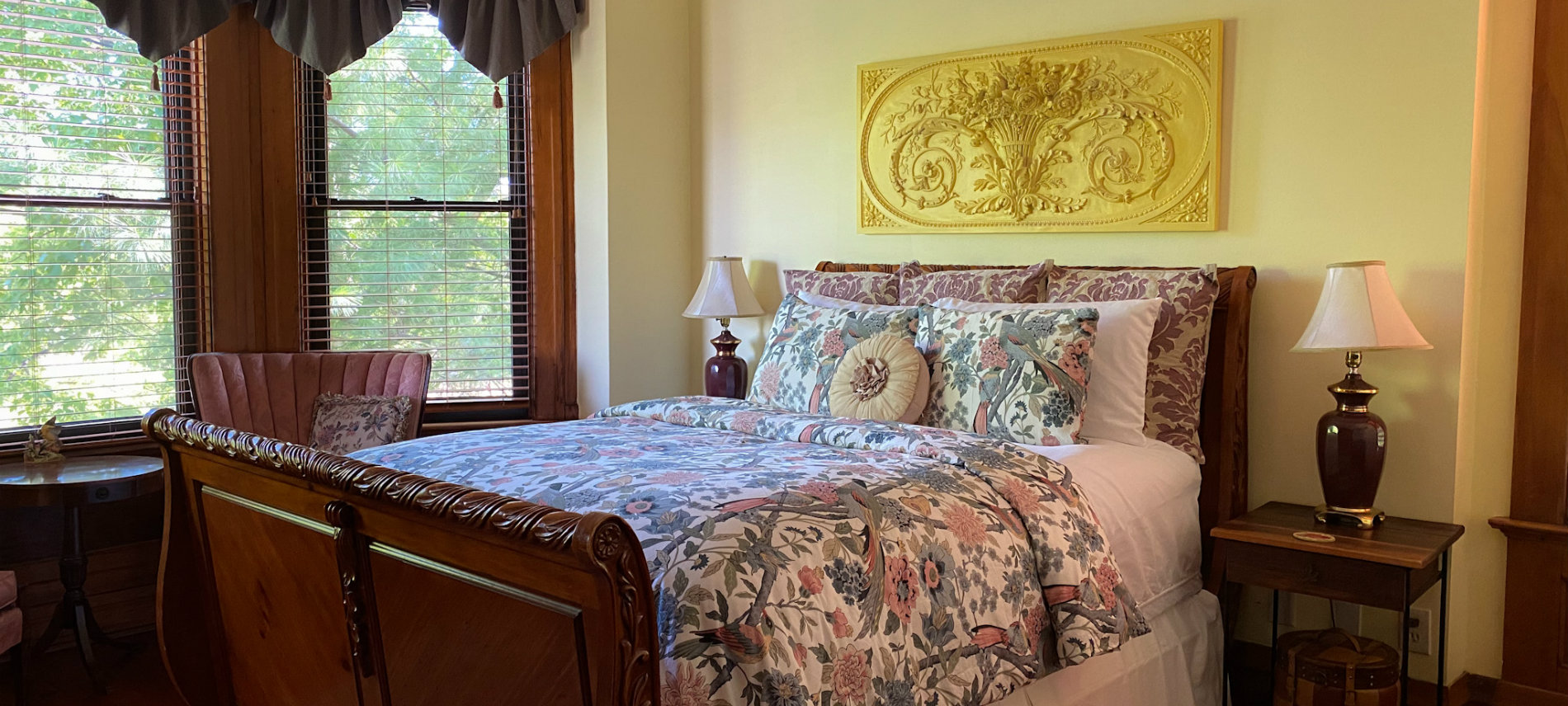 Sleigh bed with floral comforter